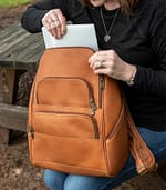 Julia ladies leather backpack holding a 14in laptop
