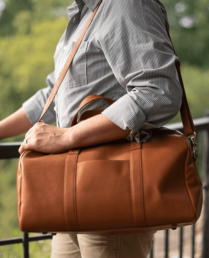 Small leather duffel bag sales