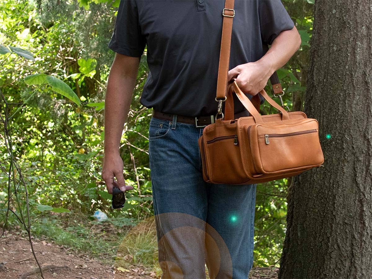 person carrying range bag